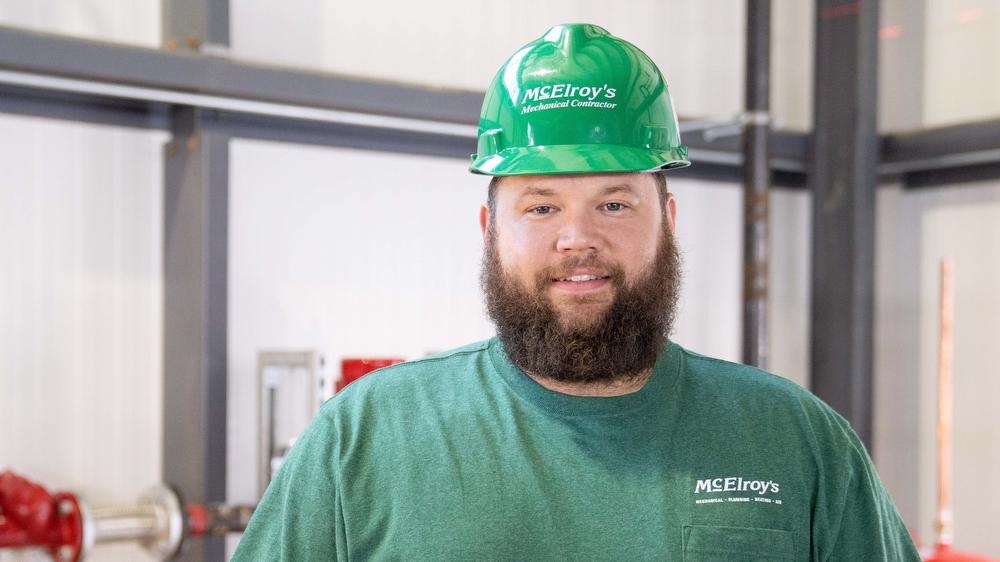 Chris Perkins, McElroy’s plumbing/pipefitting technician, celebrates his 10th McElroy’s anniversary, May 28, 2023.