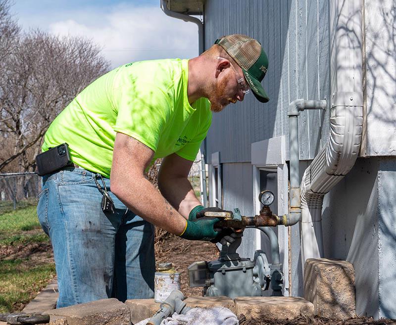 McElroy's plumbing technician replacing gas piping at the meter.