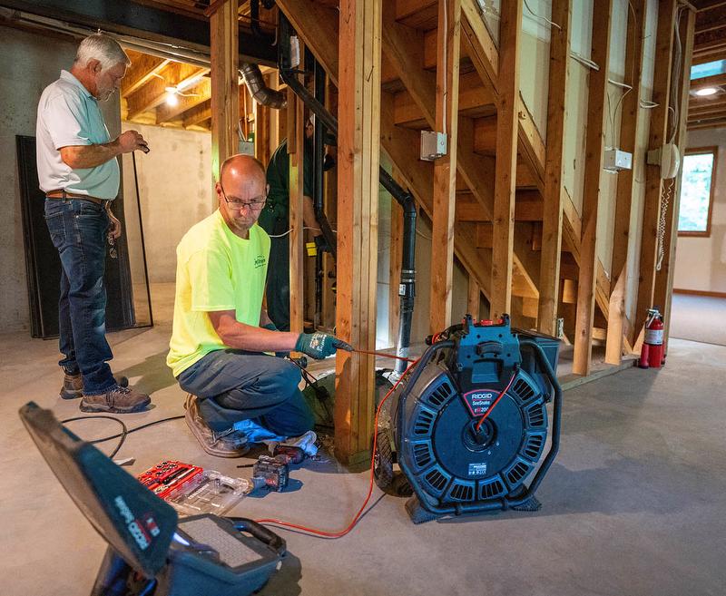 McElroy's plumbers conduct digital video sewer inspection.