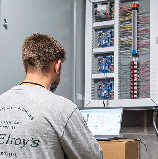 McElroy’s building-automation technician uses online tools to manage a building-automation system.