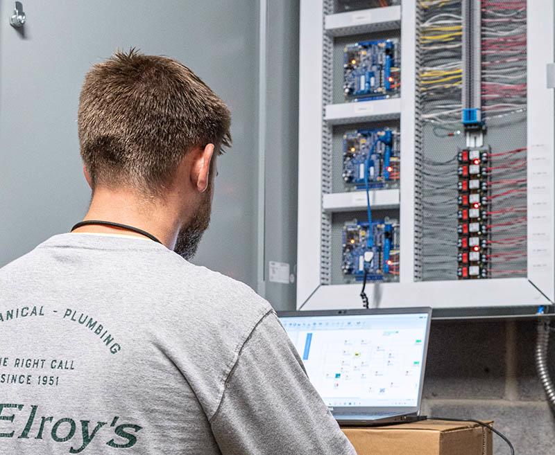 McElroy’s building-automation technician uses online tools to manage a building-automation system.