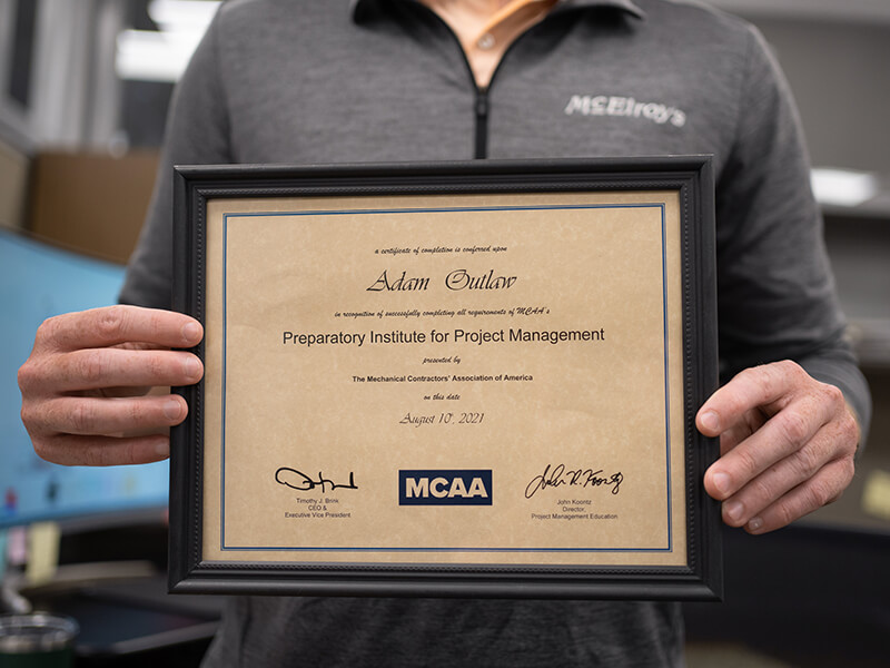 Certificate of Completion earned by Adam Outlaw of McElroy’s for the MCAA Preparatory Institute for Project Management.
