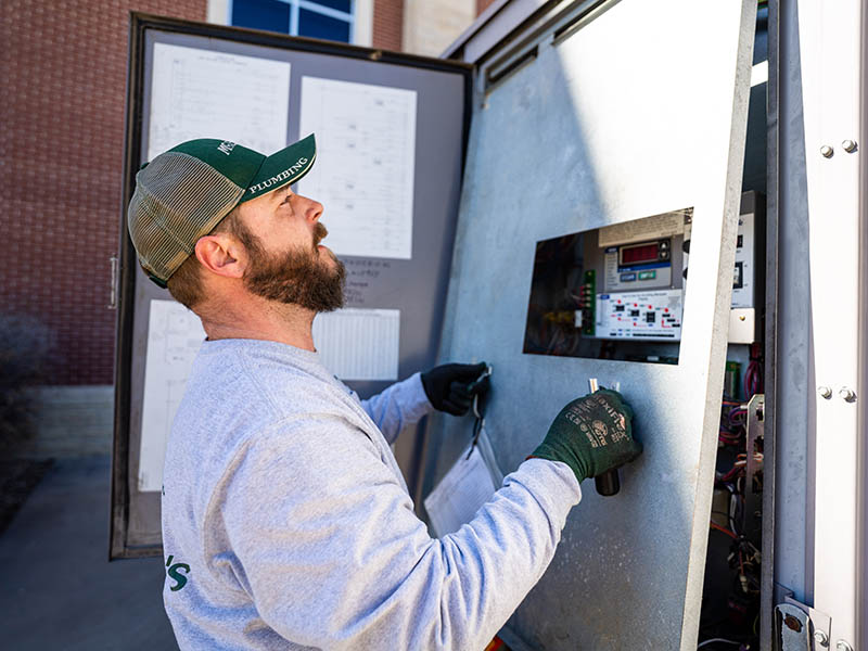 Brent Gordon services a chiller to help maintain comfort and health at the Tallgrass medical building.