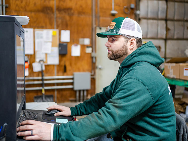 Rhett Reynolds works online to purchase and track parts, tools and materials for McElroy’s construction plumbing division.