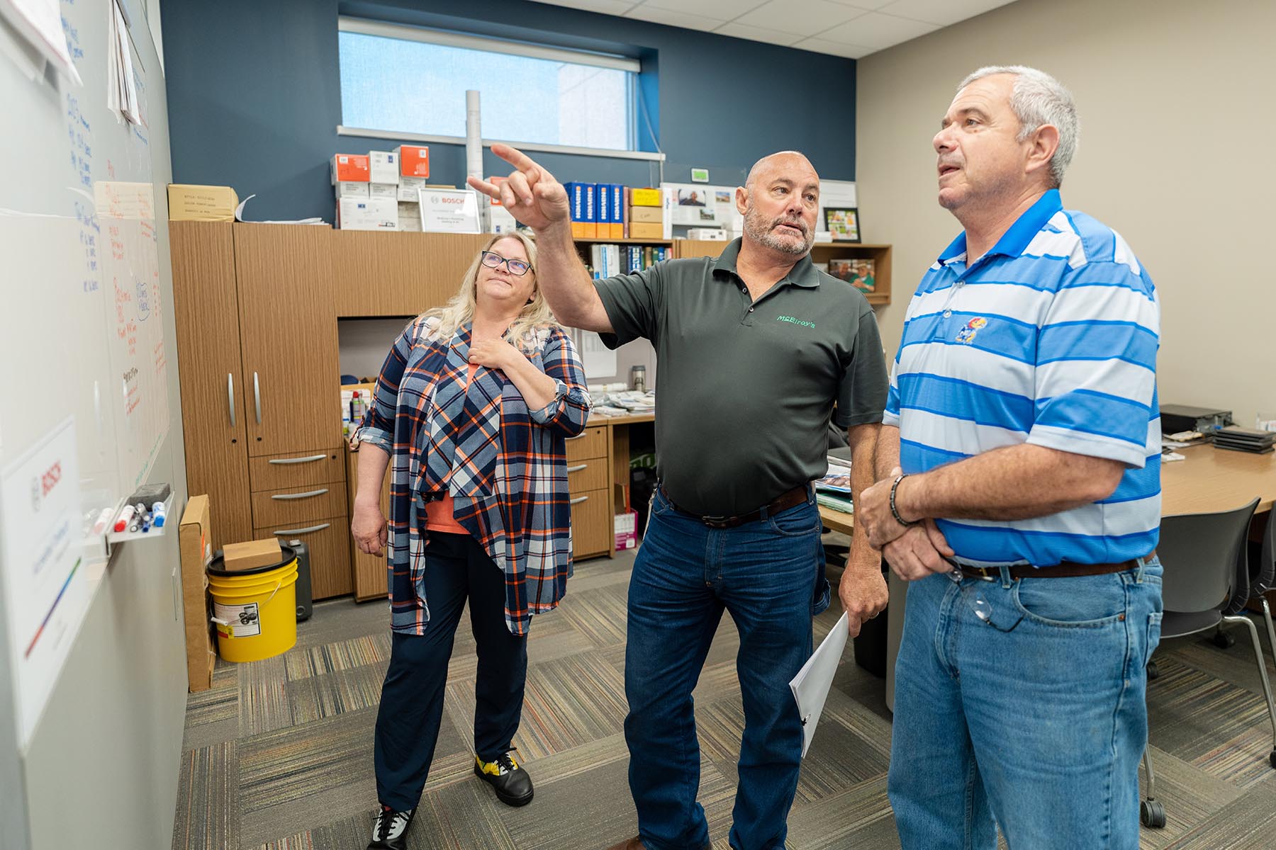 Julie Schirmer, McElroy’s residential HVAC service rep, Greg Hunsicker and Haig Sarkesian, McElroy’s residential HVAC sales, discuss current projects.