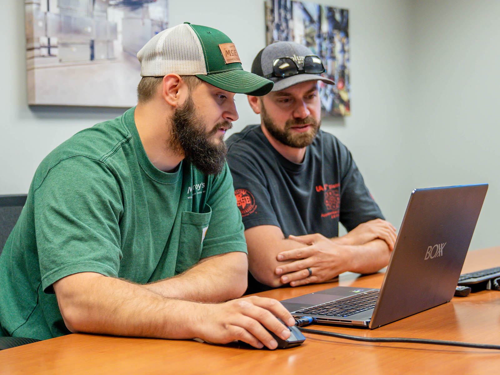 Joey Towle and Brent Eisenbarth review BIM designs to ensure that planned mechanical systems within buildings will fit and operate correctly.