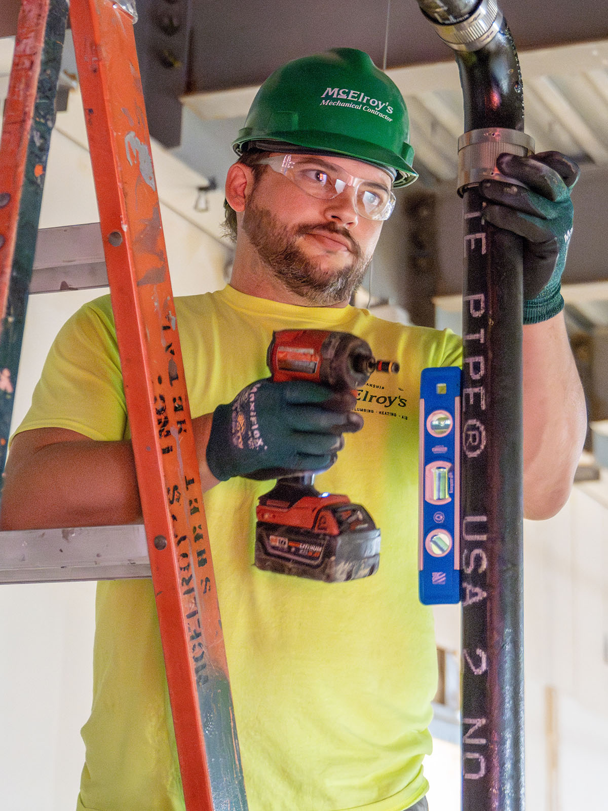 McElroy’s plumbing/pipefitting foreman, Chad Brucken, carefully installs medical facility piping for the highest functional integrity.