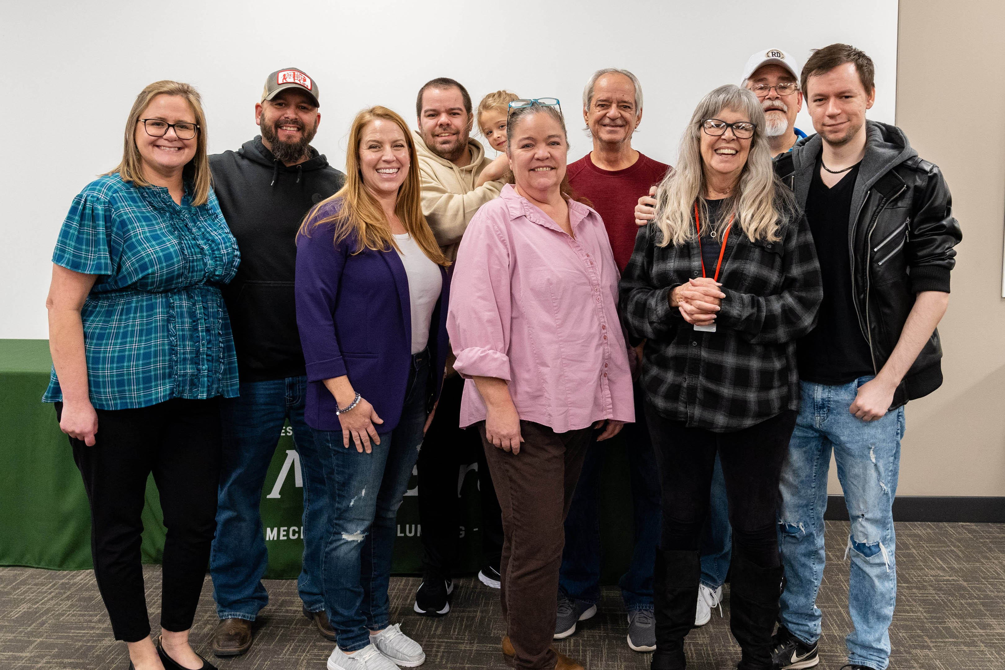 Barb Rittenhouse celebrates her coming retirement with family members who attended her McElroy’s retirement party.