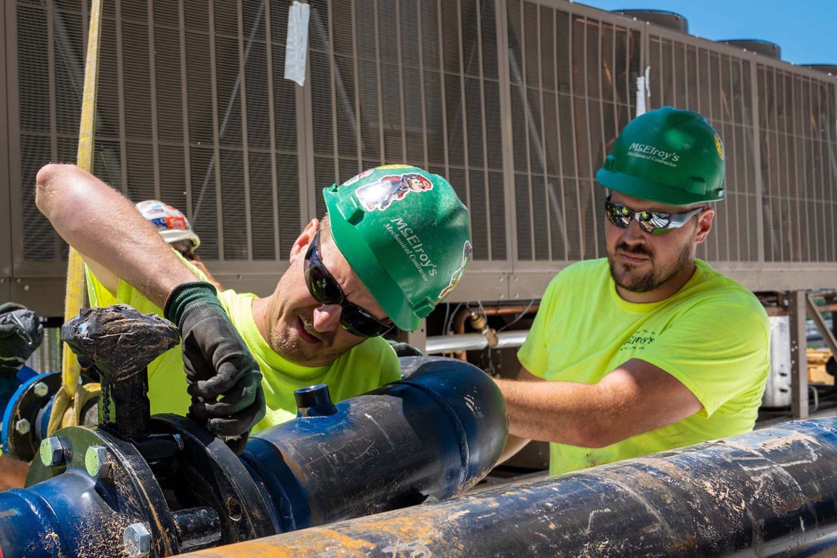 Lee Larson, McElroy’s plumber, works on plumbing/pipefitting construction at a new healthcare facility in Manhattan, Kansas.