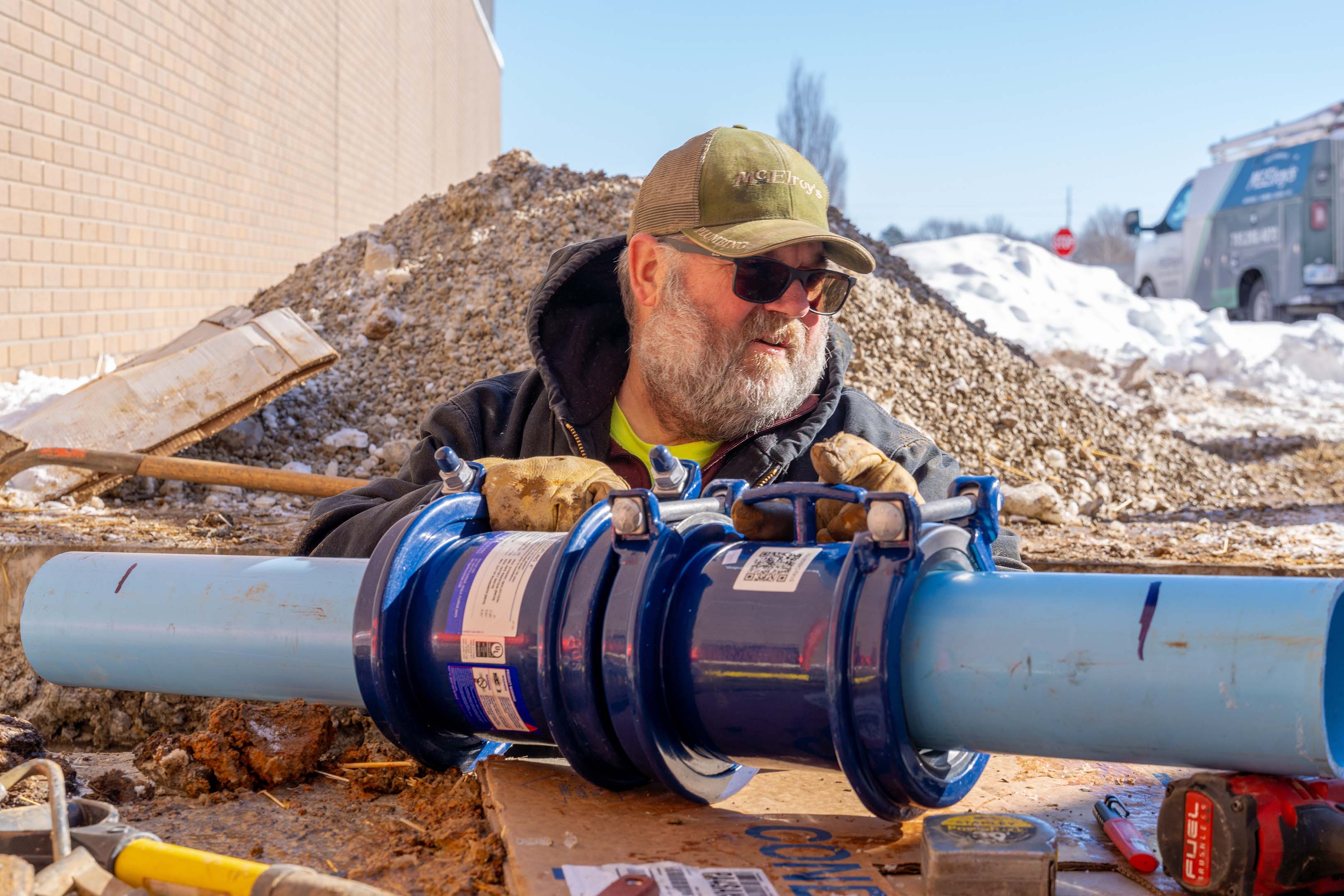 While working as a McElroy’s plumber, Shawn O'Malley replaced a burst water main at Shawnee Heights High School.