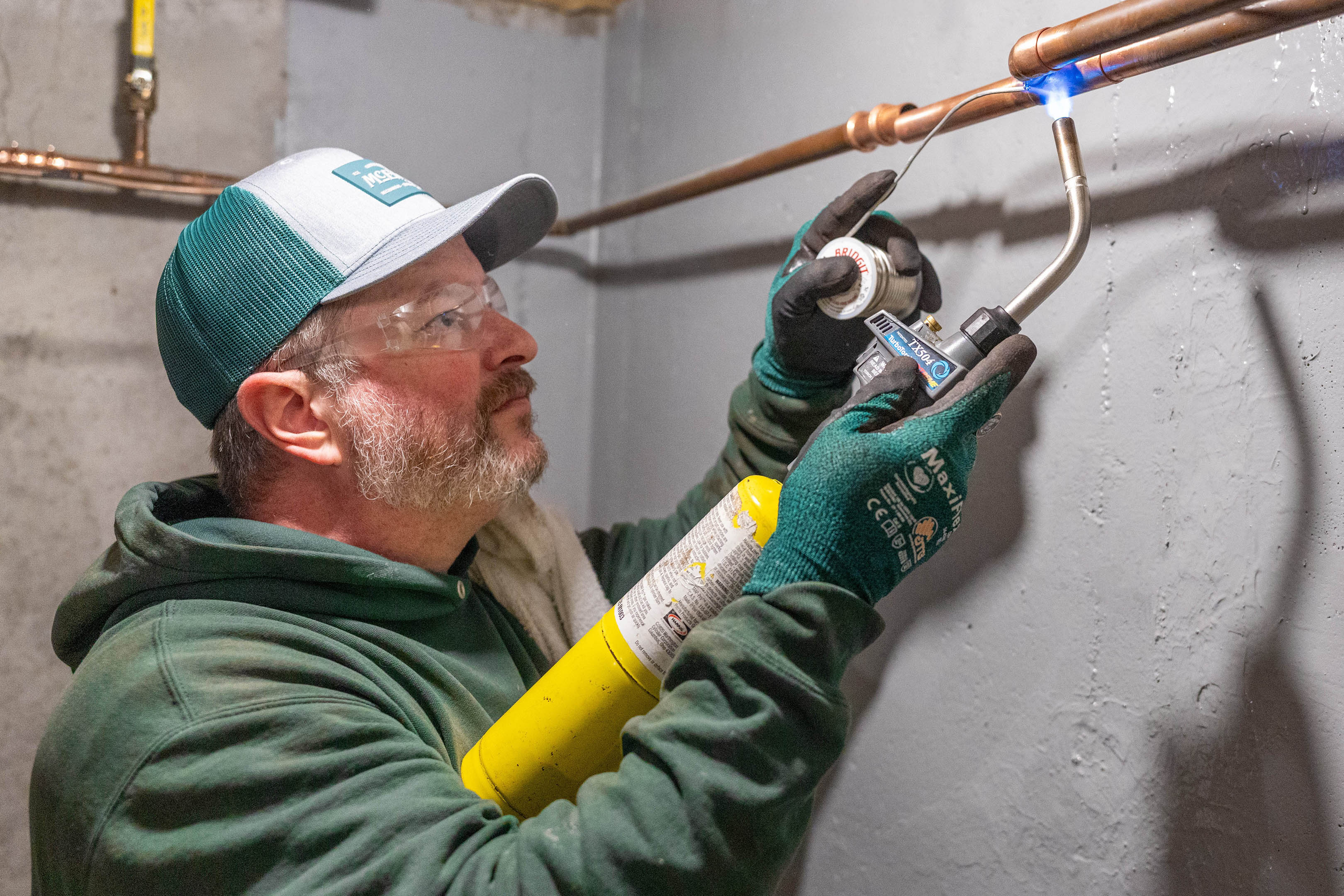 James King, McElroy’s plumber, is an expert at connecting copper pipe by brazing.