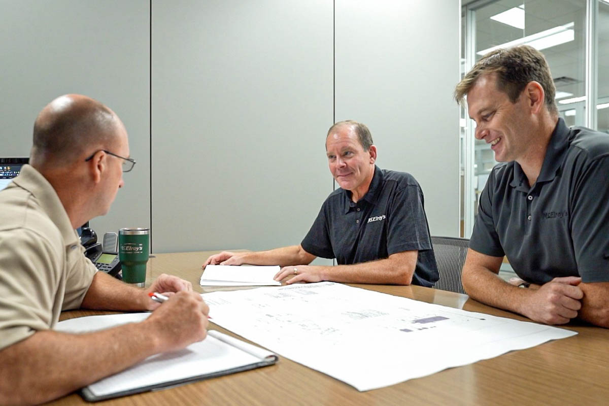 McElroy’s Chairman Dan Beal discusses a project with fellow McElroy’s licensed engineers Wade Jueneman and Richard Hammer.