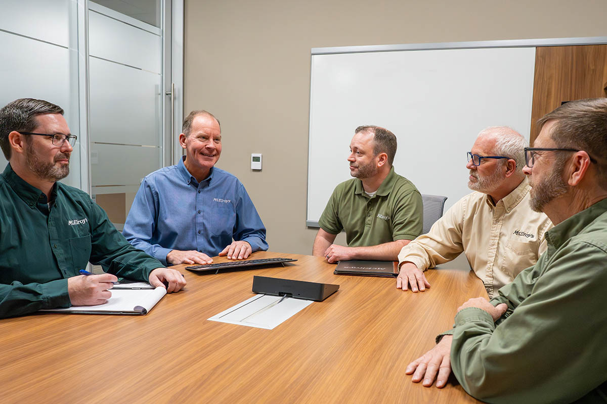 McElroy’s Chairman Dan Beal meets with part of his management team representing HR, Finance, Marketing and IT.
