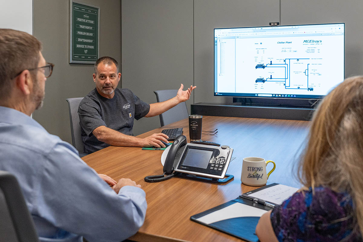 McElroy’s Vice President, Keith Watkins, discusses the design and function of a building controls system to teammates.